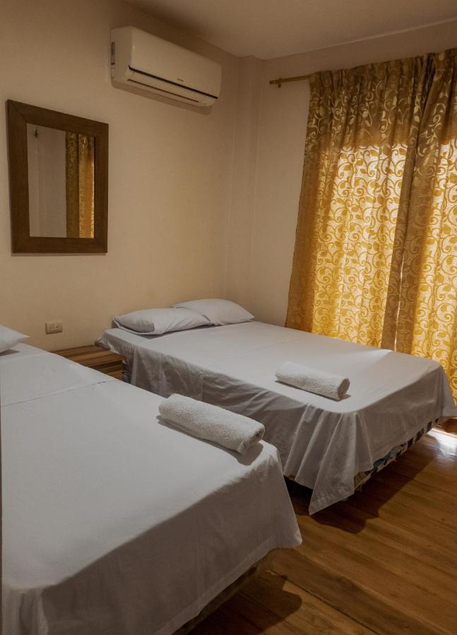 Hostal Tortuga Dorada ปูแอร์โตโลเปซ ภายนอก รูปภาพ