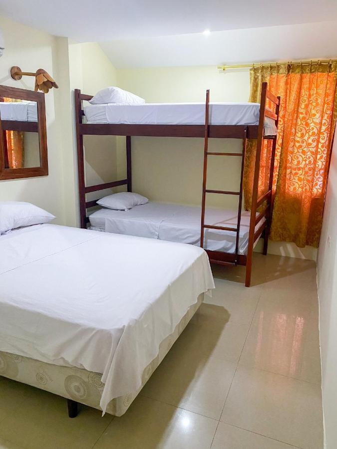 Hostal Tortuga Dorada ปูแอร์โตโลเปซ ภายนอก รูปภาพ