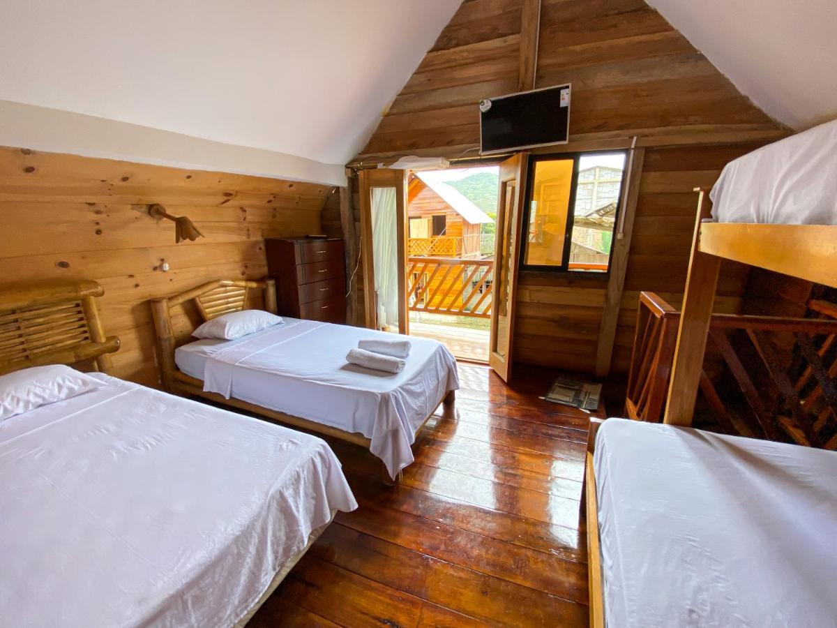 Hostal Tortuga Dorada ปูแอร์โตโลเปซ ภายนอก รูปภาพ