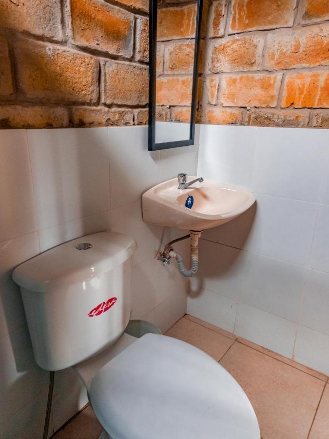 Hostal Tortuga Dorada ปูแอร์โตโลเปซ ภายนอก รูปภาพ